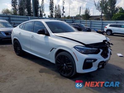 Czwarte zdjęcie samochodu z boku: 2021 BMW X6 SDRIVE 40I VIN:5UXCY4C01M9F28237 - miniatura