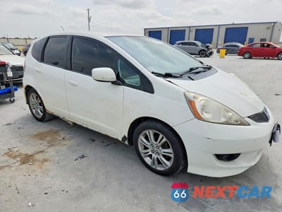 Czwarte zdjęcie samochodu z boku: 2009 HONDA FIT SPORT VIN:JHMGE88659S040114 - miniatura