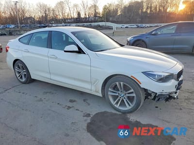 Czwarte zdjęcie samochodu z boku: 2018 BMW 330 XIGT VIN:WBA8Z9C54JB220281 - miniatura