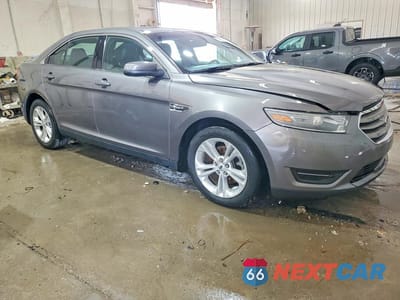 Czwarte zdjęcie samochodu z boku: 2014 FORD TAURUS SEL VIN:1FAHP2E8XEG144720 - miniatura