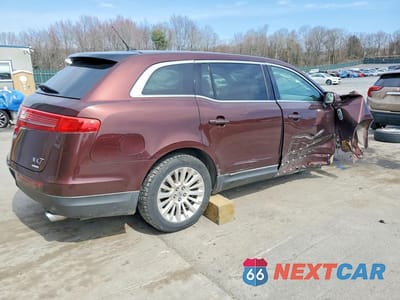 Trzecie zdjęcie samochodu z tyłu: 2012 LINCOLN MKT VIN:2LMHJ5AT8CBL53398 - miniatura