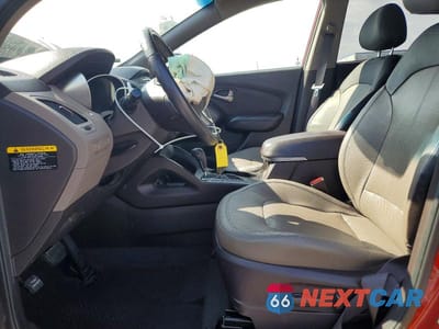 Zdjęcie 7 z 13 samochodu: 2012 HYUNDAI TUCSON LIMITED VIN:KM8JU3AC4CU511013 - miniatura