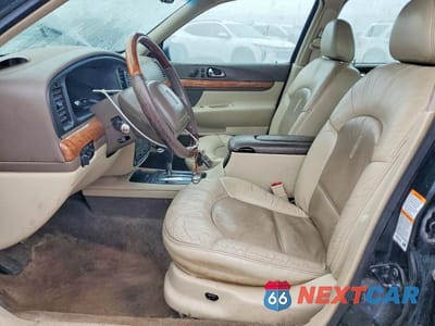 Zdjęcie 7 z 12 samochodu: 1999 LINCOLN CONTINENTAL VIN:1LNHM97V8XY705097 - miniatura