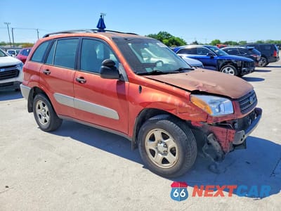 Czwarte zdjęcie samochodu z boku: 2003 TOYOTA RAV4 BASE VIN:JTEHH20V130237101 - miniatura