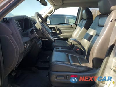 Zdjęcie 7 z 12 samochodu: 2014 HONDA RIDGELINE RTL-S VIN:5FPYK1F64EB014501 - miniatura