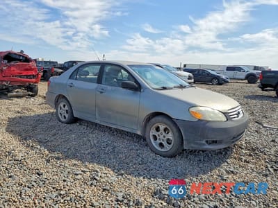 Czwarte zdjęcie samochodu z boku: 2004 TOYOTA COROLLA LE VIN:1NXBR32E14Z331110 - miniatura