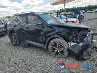 Czwarte zdjęcie samochodu z boku: 2017 TOYOTA RAV4 XLE VIN:2T3WFREV2HW350092 - miniatura