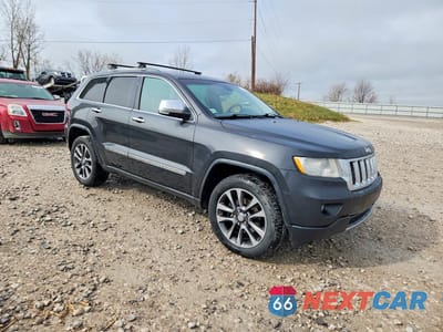 Czwarte zdjęcie samochodu z boku: 2011 JEEP GRAND CHEROKEE OVERLAND VIN:1J4RR6GT1BC607374 - miniatura