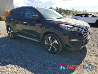Czwarte zdjęcie samochodu z boku: 2017 HYUNDAI TUCSON LIMITED VIN:KM8J33A22HU365681 - miniatura