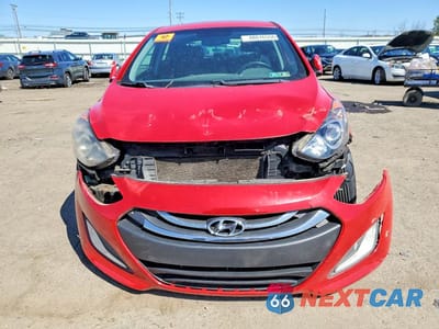 Piąte zdjęcie samochodu w środku: 2013 HYUNDAI ELANTRA GT BASE VIN:KMHD35LE8DU086777 - miniatura