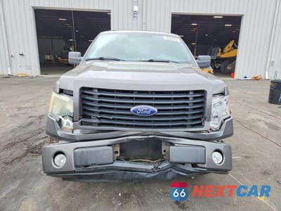 Piąte zdjęcie samochodu w środku: 2014 FORD F150 SUPERCREW VIN:1FTFW1CF8EFA07796 - miniatura