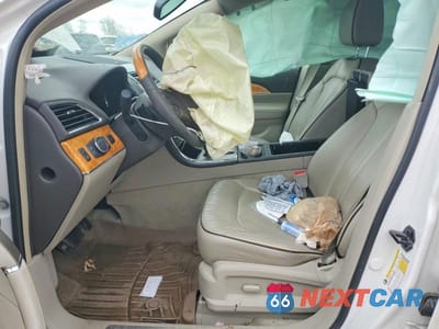 Zdjęcie 7 z 13 samochodu: 2013 LINCOLN MKX VIN:2LMDJ8JK6DBL14382 - miniatura