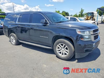 Czwarte zdjęcie samochodu z boku: 2019 CHEVROLET SUBURBAN C1500 LT VIN:1GNSCHKC5KR390556 - miniatura