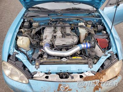Zdjęcie 11 z 12 samochodu: 2001 MAZDA MX-5 MIATA BASE VIN:JM1NB353710214635 - miniatura