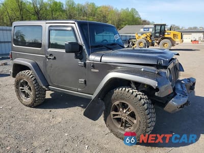 Czwarte zdjęcie samochodu z boku: 2016 JEEP WRANGLER SAHARA VIN:1C4GJWBG8GL322323 - miniatura