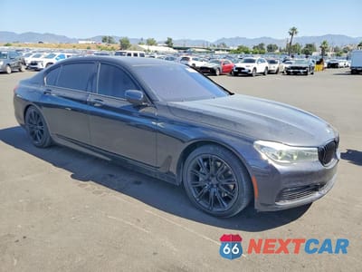 Czwarte zdjęcie samochodu z boku: 2016 BMW 740 I VIN:WBA7E2C56GG547050 - miniatura