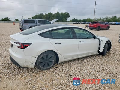 Trzecie zdjęcie samochodu z tyłu: 2024 TESLA MODEL 3 VIN:5YJ3E1EA4RF865901 - miniatura