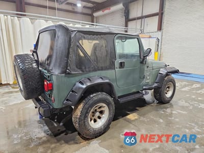 Trzecie zdjęcie samochodu z tyłu: 2000 JEEP WRANGLER / TJ SPORT VIN:1J4FA49SXYP712676 - miniatura