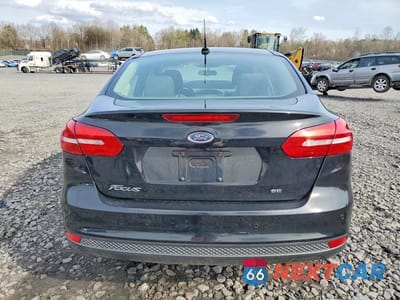 Zdjęcie 6 z 13 samochodu: 2017 FORD FOCUS SEL VIN:1FADP3H28HL207868 - miniatura