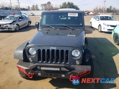 Piąte zdjęcie samochodu w środku: 2016 JEEP WRANGLER UNLIMITED SPORT VIN:1C4BJWDG2GL253149 - miniatura