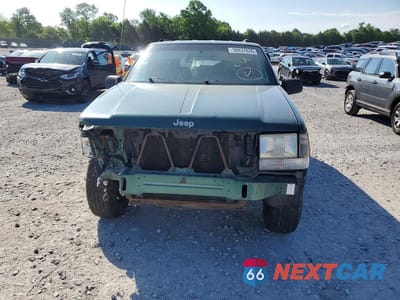 Piąte zdjęcie samochodu w środku: 1998 JEEP GRAND CHEROKEE LAREDO VIN:1J4FX58S7WC317266 - miniatura