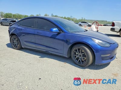 Czwarte zdjęcie samochodu z boku: 2022 TESLA MODEL 3 VIN:5YJ3E1EA5NF188738 - miniatura