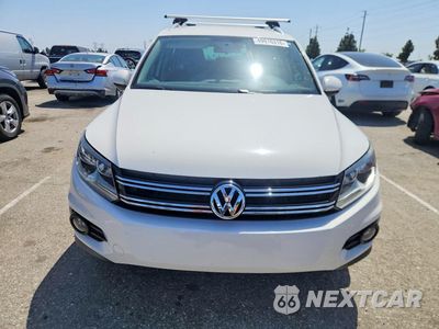 Piąte zdjęcie samochodu w środku: 2014 VOLKSWAGEN TIGUAN S VIN:WVGAV3AX4EW550496 - miniatura