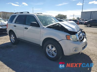 Czwarte zdjęcie samochodu z boku: 2011 FORD ESCAPE XLT VIN:1FMCU0D78BKB25467 - miniatura