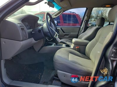 Zdjęcie 7 z 11 samochodu: 2004 JEEP GRAND CHEROKEE LAREDO VIN:1J4GX48S24C312035 - miniatura