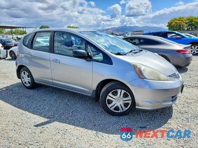 Czwarte zdjęcie samochodu z boku: 2010 HONDA FIT VIN:JHMGE8G25AC013623 - miniatura