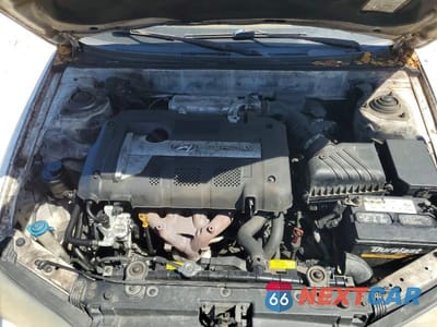 Zdjęcie 11 z 13 samochodu: 2005 HYUNDAI ELANTRA GLS VIN:KMHDN46D35U107186 - miniatura