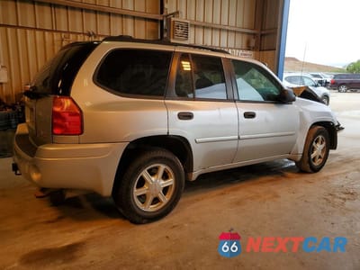 Trzecie zdjęcie samochodu z tyłu: 2009 GMC ENVOY SLE VIN:1GKDS33SX92117018 - miniatura