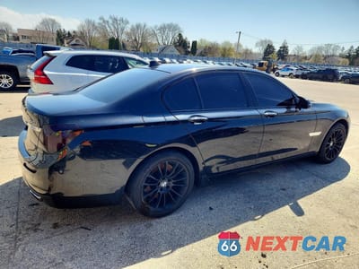 Trzecie zdjęcie samochodu z tyłu: 2014 BMW 750 I VIN:WBAYA8C55ED499865 - miniatura