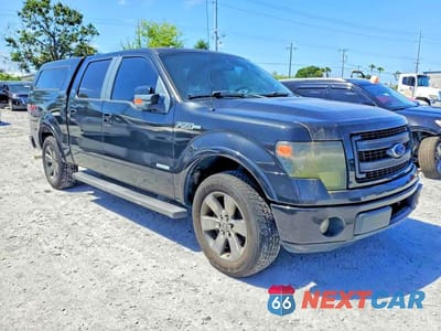 Czwarte zdjęcie samochodu z boku: 2013 FORD F150 SUPERCREW VIN:1FTFW1CT0DFC77125 - miniatura