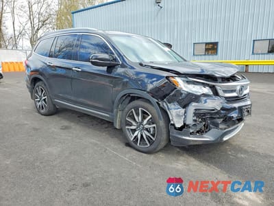 Czwarte zdjęcie samochodu z boku: 2019 HONDA PILOT TOURING VIN:5FNYF6H60KB012523 - miniatura