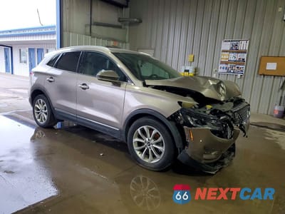 Czwarte zdjęcie samochodu z boku: 2019 LINCOLN MKC SELECT VIN:5LMCJ2D90KUL30367 - miniatura