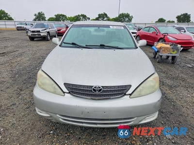 Piąte zdjęcie samochodu w środku: 2004 TOYOTA CAMRY LE VIN:4T1BE32K34U831223 - miniatura