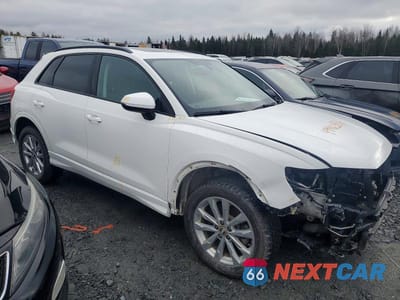 Czwarte zdjęcie samochodu z boku: 2020 AUDI Q3 PREMIUM VIN:WA1AECF35L1011173 - miniatura