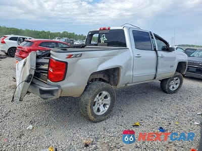 Trzecie zdjęcie samochodu z tyłu: 2018 CHEVROLET SILVERADO K1500 LT VIN:3GCUKREC2JG474354 - miniatura