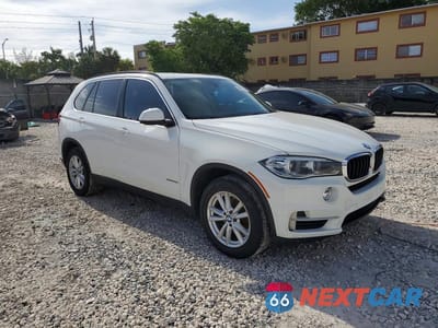 Czwarte zdjęcie samochodu z boku: 2015 BMW X5 SDRIVE35I VIN:5UXKR2C55F0H35617 - miniatura