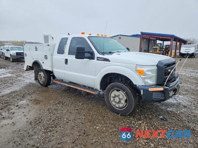 Czwarte zdjęcie samochodu z boku: 2014 FORD F250 SUPER DUTY UTILITY / SERVICE TRUCK VIN:1FT7X2B64EEB70816 - miniatura