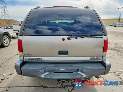 Zdjęcie 6 z 14 samochodu: 1999 GMC JIMMY VIN:1GKDT13WXX2549416 - miniatura