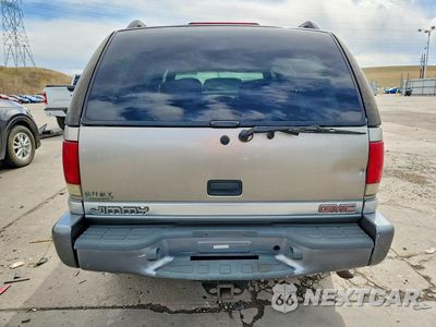 Zdjęcie 6 z 14 samochodu: 1999 GMC JIMMY VIN:1GKDT13WXX2549416 - miniatura