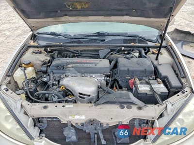 Zdjęcie 12 z 14 samochodu: 2005 TOYOTA CAMRY LE VIN:4T1BE32K15U633368 - miniatura