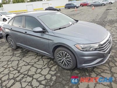 Czwarte zdjęcie samochodu z boku: 2021 VOLKSWAGEN JETTA S VIN:3VWC57BU8MM019189 - miniatura