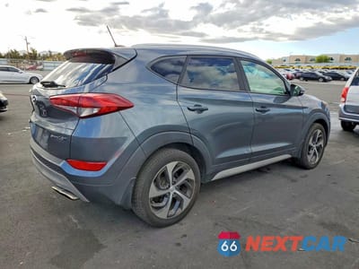 Trzecie zdjęcie samochodu z tyłu: 2017 HYUNDAI TUCSON SPORT VIN:KM8J33A26HU529529 - miniatura