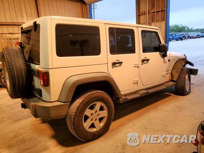 Trzecie zdjęcie samochodu z tyłu: 2014 JEEP WRANGLER UNLIMITED SPORT VIN:1C4BJWDG2EL126835 - miniatura