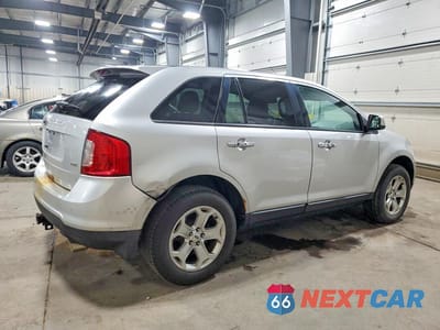 Trzecie zdjęcie samochodu z tyłu: 2011 FORD EDGE SEL VIN:2FMDK3JCXBBA57650 - miniatura