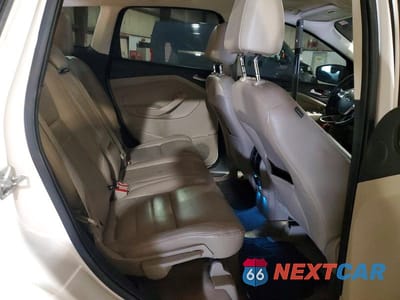 Zdjęcie 11 z 13 samochodu: 2014 FORD ESCAPE TITANIUM VIN:1FMCU9J98EUA73034 - miniatura