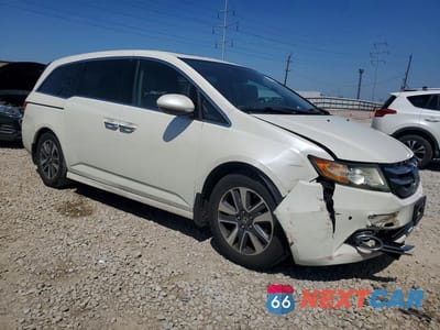Czwarte zdjęcie samochodu z boku: 2014 HONDA ODYSSEY TOURING VIN:5FNRL5H93EB016670 - miniatura